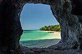 View through the rocks to the beach of Koh Lao Liang island, Thailand, Asia