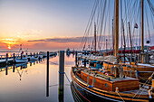 Kleinfischerbruecke and museum harbor with boats in Heiligenhafen in the morning light, harbour, Baltic Sea, Ostholstein, Schleswig-Holstein, Germany