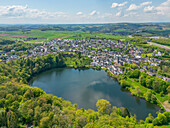 Ulmen Maar with town and parish church of St. Matthias, Ulmen, Eifel, Rhineland-Palatinate, Germany