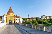 Budweiser Gate looking across Hirschgarten to Castle Tower, Small Castle, Palace and Castle in Český Krumlov in South Bohemia in the Czech Republic
