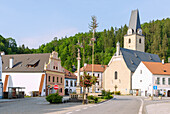 Market Square with St. Nepomuk Fountain, Church of St. Nicholas and Hotel Ruze in Rožmberk nad Vltavou in South Bohemia in the Czech Republic