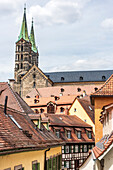 Alley with a view of the cathedral in houses in the old town in Bamberg, Upper Franconia, Bavaria, Germany