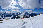 Two women on a ski tour climb up to Kuhmesser, Gilfert in the background, Kuhmesser, Tux Alps, Tyrol, Austria