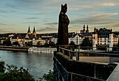 Statue of Elector Balduin on the Balduin Bridge (14th century), in the background the old town on the Moselle with Florinskirche, Liebfrauenkirche and Old Castle, Upper Middle Rhine Valley, Rhineland-Palatinate, Germany