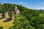 Aerial view of St. Mark's Chapel on the hillside in the Hessisches Kegelspiel region, Burghaun Rothenkirchen, Rhön, Hesse, Germany
