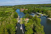 Aerial view of a Le Boat Horizon 4 houseboat in Temple Lock along the River Thames with weir, Temple, near Marlow, Buckinghamshire, England, United Kingdom