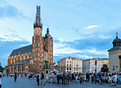 St. Mary's Church (Kościół Mariacki) and Rynek Glówny in the evening light in the old town of Kraków in Poland