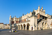 Rynek Glówny with Cloth Hall (Sukienice) in the morning light in the old town of Kraków in Poland