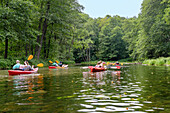 Kayaks on the Krutynia in Krutyń in Masuria (Mazury) in the Warmińsko-Mazurskie Voivodeship in Poland