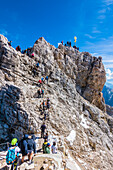 Climbers, summit cross, Zugspitze, Partenkirchen, Bavaria, Germany