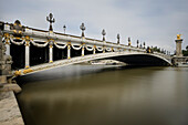 Artfully designed arch bridge Pont Alexandre III, Seine banks, Paris, Île-de-France, France, Europe, UNESCO World Heritage
