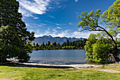 Views of Lake Wakatipu and the mountain peaks next to Queenstown New Zealand