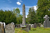 Ireland, County Wicklow, Glendalough, monastic settlement, cemetery with round tower