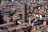 View of the roofs of Bologne and the Arcidiocesi di Bologna - Caritas Diocesan tower from the Asinelli tower, Bologna, Emilia Romagna, Italy, Europe
