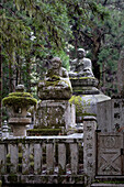 View of monks'39; tombs with statues in Okunoin Cemetery, Okuno-in, Koyasan, Koya, Ito District, Wakayama, Japan