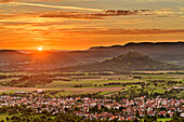 Cloudy atmosphere at sunrise over Bissingen and Weilheim an der Teck, from Hörnle, Teck, Swabian Alb, Baden-Württemberg, Germany
