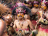  Women, tribe in traditional costume, singing, Morobe Show, Lae, Papua New Guinea 