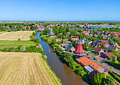  Aerial view of the twin mills of Greetsiel, Krummhörn, East Frisia, Lower Saxony, Germany 