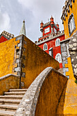  A winding staircase inside the Palacio Nacional da Pena, built in various architectural styles, above Sintra, Portugal 