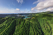  Aerial view of the Monte Palace Hotel and the crater lakes Lagoa Azul and Lagoa Verde in Sete Cidades on Sao Miguel island, Azores. 