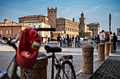  Bicycle with cap and Italian flag on the handlebars, Piazza dei Martiri, in the background, Palazzo dei Pio, Carpi, Province of Modena, Region of Emilia-Romagna, Italy, Europe 
