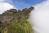 Hiking trail at Pico do Arieiro, cloudy, mountains in Madeira, Portugal