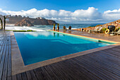 Infinity swimming pool overlooking Atlantic Ocean, Hotel auberge Dar Najmat, Mirleft, Morocco, north Africa