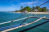  Cowrie Island seen from Bangka outrigger canoe tour boat, Honda Bay, near Puerto Princesa, Palawan, Philippines 