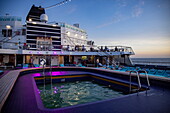  Oasis pool on board cruise ship Vasco da Gama (nicko cruises) at dusk, at sea, near the Philippines 