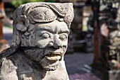  Stone sculpture at Pura Puseh Desa Batuan Hindu Temple, Denpasar, Bali, Indonesia 