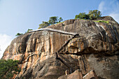 Metal staircase climbing to rock palace fortress, Sigiriya, Central Province, Sri Lanka, Asia