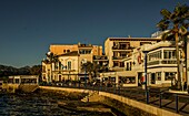  Evening atmosphere on the sea promenade of Port d´Andratx, Mallorca, Spain 