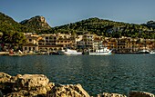  View of fishing boats on the sea promenade in Port d´Andratx, mountainous coastal area in the background, Mallorca, Spain 