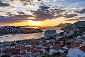  Cruise ship Norwegian Escape in the port of Dubrovnik at sunset, Croatia, Europe  