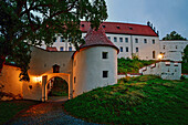  Evening mood, Hohes Schloss, late Gothic castle of the bishops of Augsburg on a hill above the old town of Füssen, Bavaria, Germany 