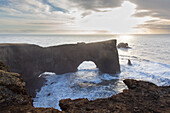  View of the rock gate of Dyrholaey, winter, South Iceland, Iceland 