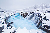  Hlauptungufoss waterfall, winter, Southland, Iceland 