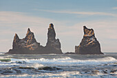  Basalt rock needles Reynisdrangar, Reynisfjara, winter, Iceland 