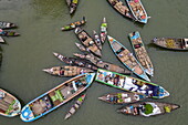  Aerial view of traders selling fruits from boats at Boithakata floating market on Belua river, Boithakata, Pirojpur district, Bangladesh, Asia 