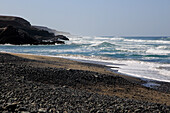 Waves breaking on beach at Playa de Garcey, Fuerteventura, Canary Islands, Spain