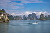  Small excursion boat and karst islands, Lan Ha Bay, Haiphong, Vietnam, Asia 