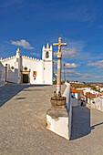 Historic whitewashed church Igreja Matrix in medieval village of Mértola, Baixo Alentejo, Portugal, Southern Europe