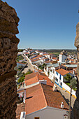 View over rooftops of whitewashed houses and streets in the small rural settlement village of Terena, Alentejo Central, Portugal, Southern Europe from ramparts of Castle of Terena, a listed national monument