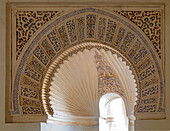 Islamic design architectural detail inside the Moorish palace of the Alcazaba, Malaga, Andalusia, Spain - decorated arches