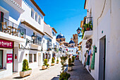  Altea, white village of the Costa Blanca, on the mountain, main street San Miguel, with church Nuestra Senora de Consuleo, province of Alicante Spain 