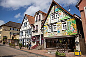  Colorful murals and half-timbered houses in the old town, Steinau an der Straße, Spessart-Mainland, Hesse, Germany 