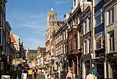 Historic buildings and famous fourteenth century Dom church tower in city of Utrecht, Netherlands