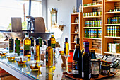  Olive oil tasting in the shop of the olive oil factory Hatzipetros in Linopotis near Pyli on the island of Kos in Greece 