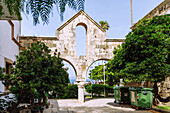  Medieval city gate with ancient capital column in Kos Town on the island of Kos in Greece 