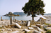  Early Christian basilica of Agios Stefanos with a view of the island of Kastri with the chapel of Agios Nikolaos, the bay of Kefalos and Agios Stefanos Beach on the island of Kos in Greece 